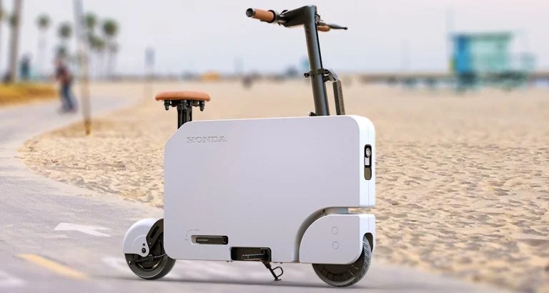 This Honda electric scooter can be folded in the style of a briefcase